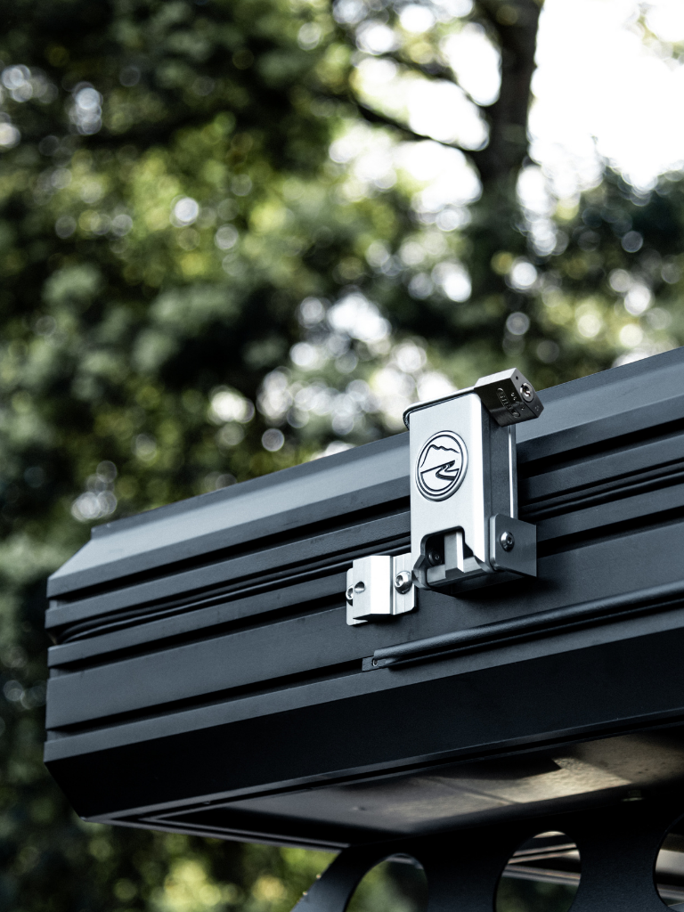 Close up photo of the fully adjustable and lockable CNC latches - solid, practical and good looking 